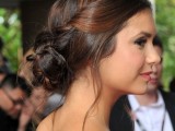 a beautiful braided and twisted low bun with some locks down and a pretty balayage is a very lovely and bold idea to rock