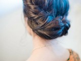 a braided and twsited halo updo is a lovely idea for a more relaxed and rustic bridal look