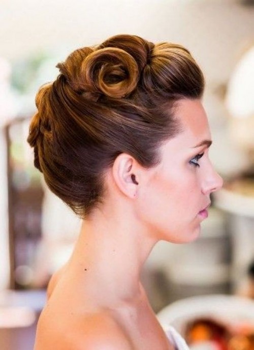 a unique wavy updo with all the hair interwoven and attached mostly on top is a very cool-looking option
