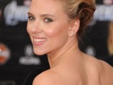 a messy and wavy updo is a chic and stylish idea for a bride with short or medium length hair and it looks very refined