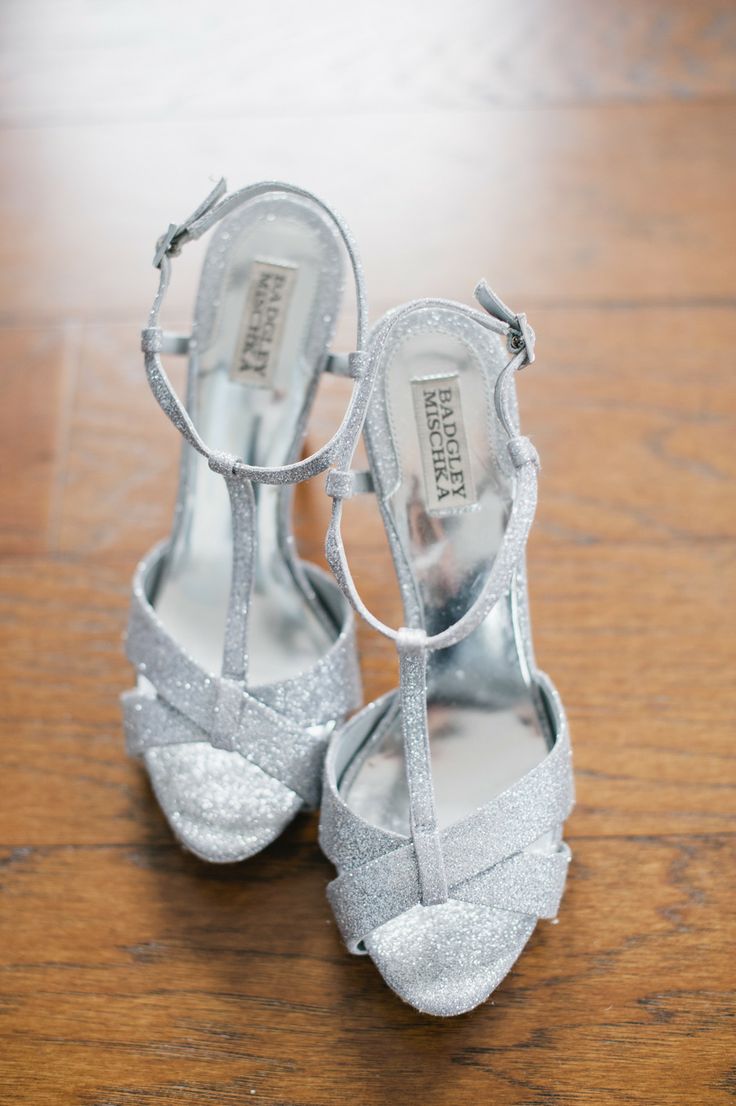 silver glitter strappy wedding shoes with T straps are a sexy and cool solution for a modern bride, they will match a lot of bridal looks