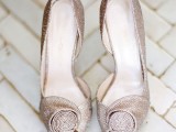 super shiny wedding shoes with stylized flowers on tops are amazing for a retro glam wedding