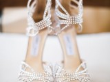 super embellished and shiny wedding shoes with delicate laser cut tops and wide embellished straps are gorgeous for a glam and shiny bride