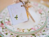 mini honey jars with wooden spoons and cool greeting cards for a spring wedding