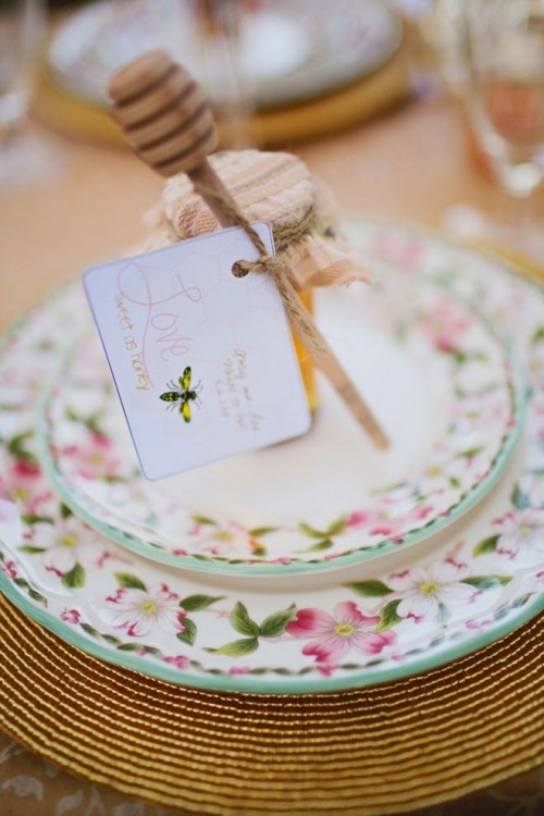 mini honey jars with wooden spoons and cool greeting cards for a spring wedding
