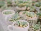 succulents planted into an assortment of tea and coffee cups are stylish and simple wedding favors for any season
