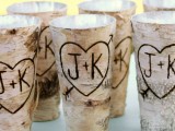 birch bark wrapped glasses or vases are great for spring woodland weddings