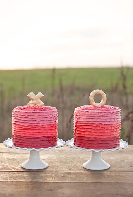 ruffle gradient pink, red and burgundy wedding cakes topped with X and O are amazing for Valentine's Day