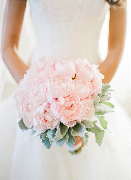 a light pink peony wedding bouquet with pale greenery is a stylish and cute idea for a spring bride