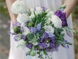 a purple and white wedding bouquet with greenery and succulent for a bright and bold spring statement