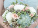 a chic spring wedding bouquet of white and blush blooms, greenery and succulents for a spring bride