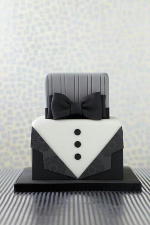 a square black and white wedding cake styled as a groom wearing a black tuxedo is a great idea of a groom's cake