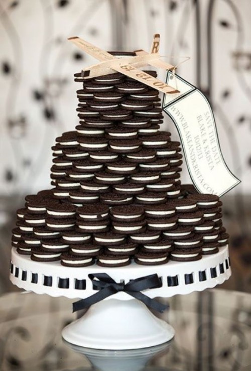 an Oreo stack topped with a wooden plane is a lovely example of a groom's cake - perfect for his party and very crowd-pleasing