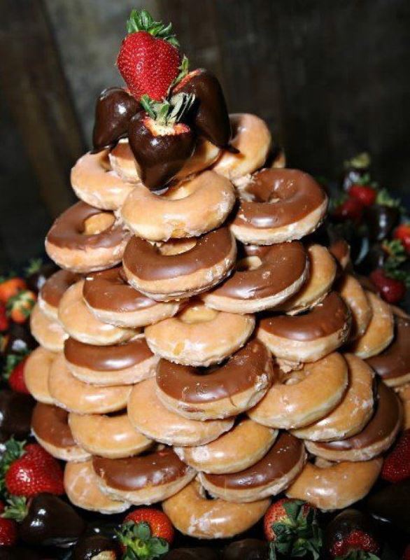 a stack of glazed donuts is a lovely alternative to any cake, a wedding or a groom's one