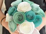 a bold ribbon wedding bouquet with turquoise and white flowers and sheer ribbons is a very creative and cool wedding bouquet