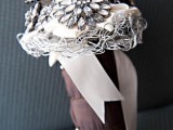 a refined neutral rhinestone and pearl brooch wedding bouquet with some wire, with a fabric wrap and ribbons is a lovely idea