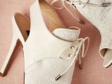 cutout white lace booties with laces are a chic idea with a hint of vintage that will add charm to your outfit