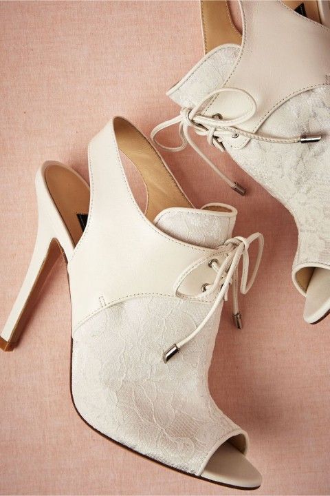 cutout white lace booties with laces are a chic idea with a hint of vintage that will add charm to your outfit