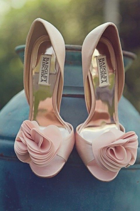 blush wedding shoes with fabric blooms on their tops are a nice spring-like idea