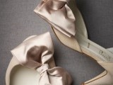 tan shoes with champagne-colored silk bows that add chic and romance to them
