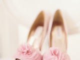 light pink peep toe wedding shoes with large fabric blooms on top are a chic touch of girlish color to your spring look