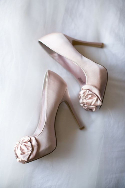 champagne-colored silk wedding high heels with peep toes and fabric blooms are a chic idea