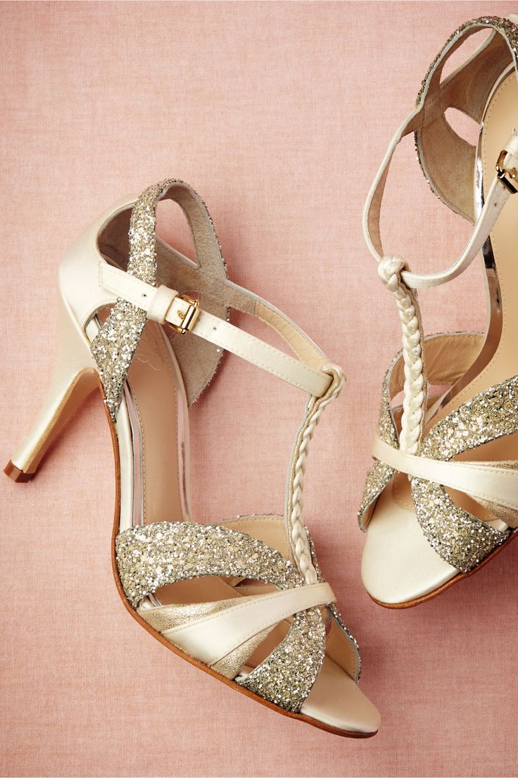 Gold and gold glitter strappy wedding shoes with a strong vintage feel and braids are a cute idea