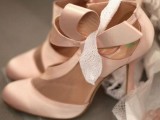 blush cutout high heels with large bows on the sides are nice for every bride who loves neutrals and a girlish touch