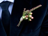 a winter boutonniere of berries and small flowers is a simple and cute all accessory to try