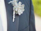 a pale winter boutonniere of a pale succulent and some pale herbs is a simple and pretty edition to the look