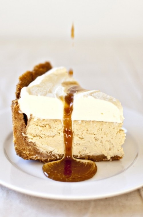 a wedding cheesecake with amber caramel drip is a stylish and delicious dessert for a fall wedding