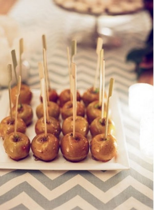 apples covered with amber glaze are delicious wedding desserts or favors for a fall or Halloween wedding