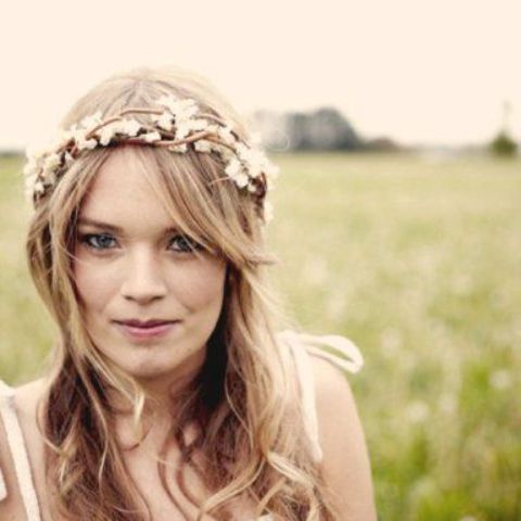 a vine and white fabric flower headpiece is a creative idea and your headpiece won't wither, great for a boho woodland wedding