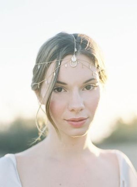 a gold chain and coin multi-layer headpiece is a wild boho chic idea for a Morocco-inspired bride