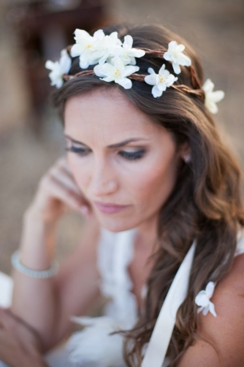 a vine headpiece with fresh white blooms is a free-spirited idea for a beach boho chic bride