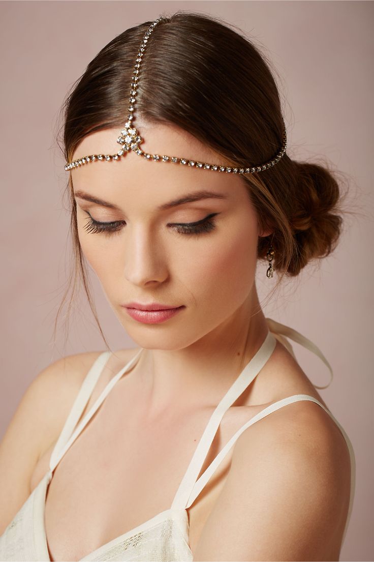 A romantic rhinestone chain style boho chic bridal headpiece will add a touch of sparkle to your look