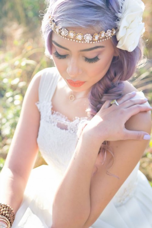 a rhinestone double headpiece with a giant fabric flower is a very whimsical idea for a boho chic bride