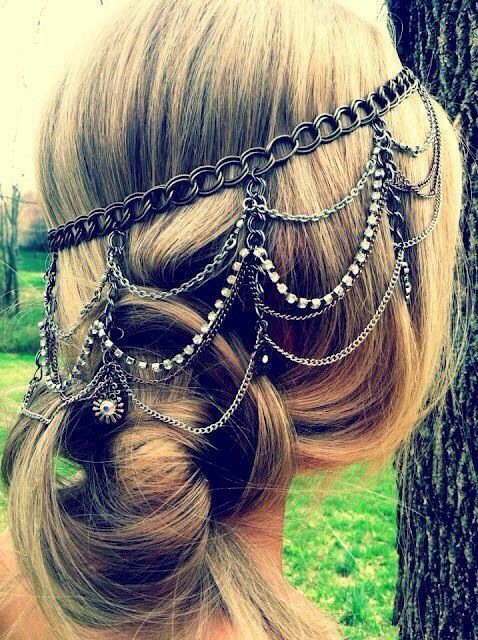 a crazy multi-layer chain and rhinestone headpiece with small flower pendants is a very bold and cool idea