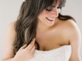 a white chain and fabric flower headband is a simple idea for a boho chic bride