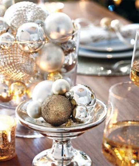 a mercury glass bowl and a glass one with gold and silver Christmas ornaments is a decoration that always works
