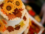 a neutral fall wedding cake topped with sugar leaves and blooms is a timeless idea for a rustic fall wedding