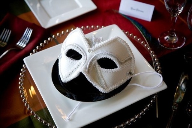 An elegant white embellished mask is a fantastic Halloween wedding favor for a masquerade wedding