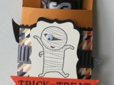 a Hershey’s bar in a paper pack with creative tags and letters is a fun and whimsy Halloween wedding favor