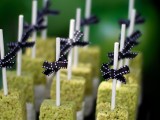 krispie rice pops with bows are cute and bold Halloween wedding favors you can make yourself
