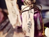 mini alcohol bottles styled as poison ones and with tags are cool wedding favors for adults for Halloween