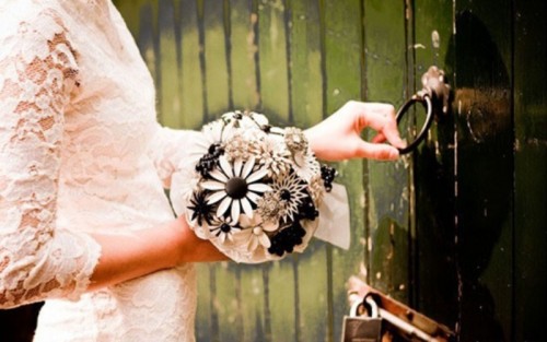 a wedding brooch wedding bouquet done in black and white