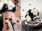 a black and white wedding bouquet with paper butterflies is a unique idea