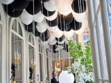 a black and white ballon installation for wedding decor