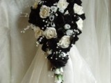 a black and white wedding bouquet of fake blooms is a durable idea