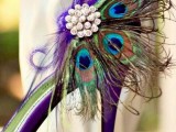 purple wedding shoes decorated with peacock feathers and vintage brooches